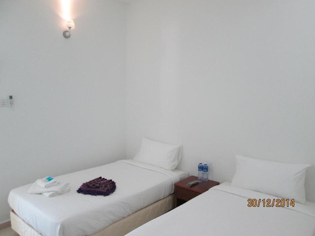 珍南海滩 Oyo 275微笑旅馆酒店 外观 照片