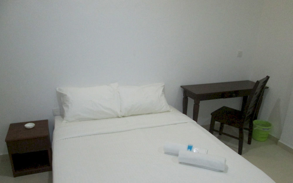 珍南海滩 Oyo 275微笑旅馆酒店 外观 照片